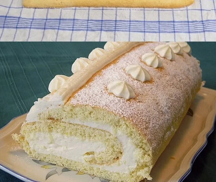 Biskuitrolle mit Zitronen und Quarkfüllung auf einem Teller angerichtet