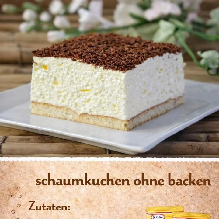 Leckerer Schaumkuchen mit flauschigem Baiser und fruchtiger Füllung, serviert auf einem Teller.