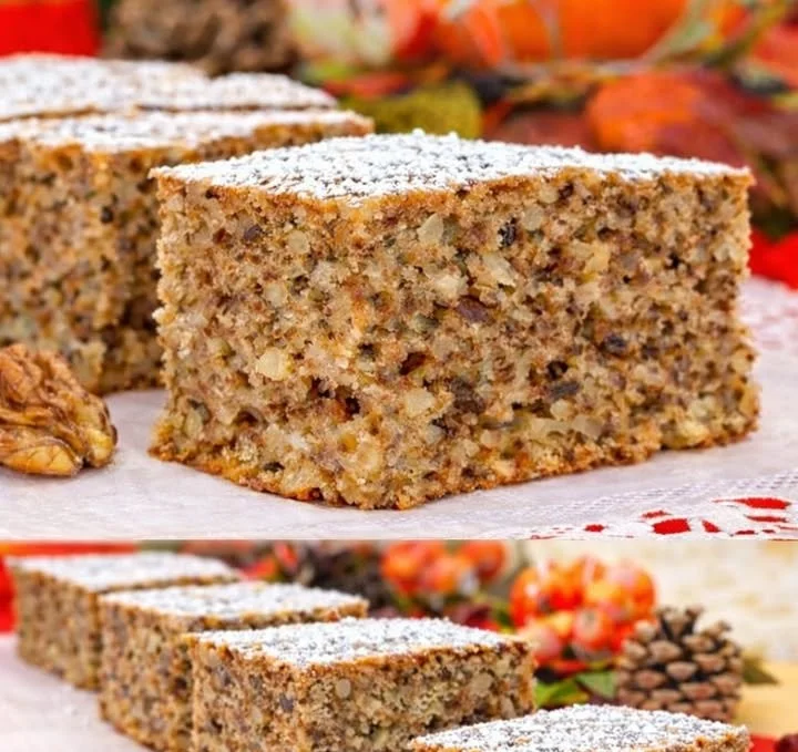 Leckerer Apfel-Walnuss-Rührkuchen auf einem Holzbrett