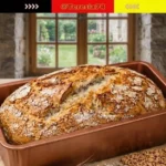 Frisches Dinkel-Joghurt-Brot auf einem Holzbrett