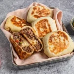 Leckere Protein-Cheeseburger-Bomben mit hohem Proteingehalt für Fitnessliebhaber.