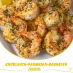 Köstliche Knoblauch-Parmesan-Garnelen aus der Heißluftfritteuse serviert auf einem Teller.