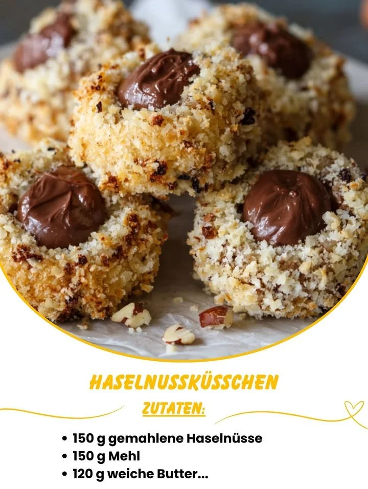 Knusprige Haselnussküßchen mit Nuss-Nougat-Füllung auf einem Teller