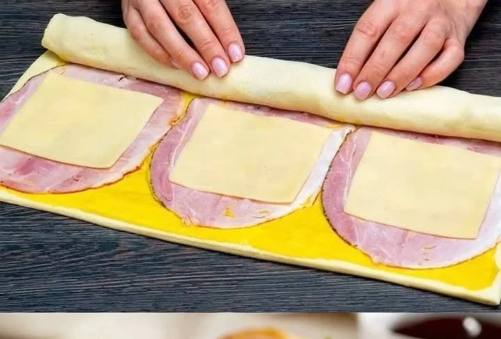 Köstliche Blätterteig Schnecken mit Käse als Snack oder Fingerfood.