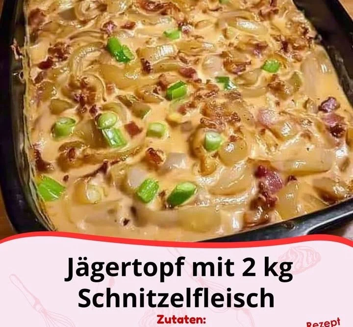 Jägerschmaus mit Schnitzelfleisch auf einem Teller angerichtet