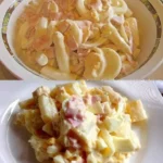 Frisch zubereiteter Spargelsalat mit buntem Gemüse und Dressing.