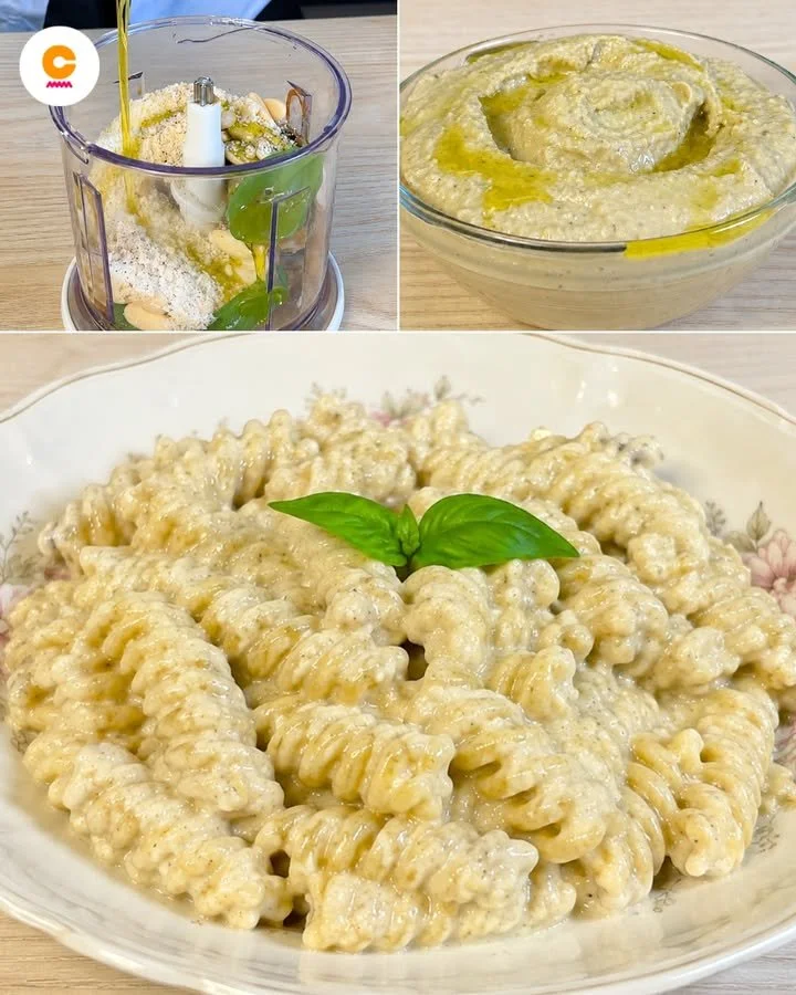 Hausgemachtes Auberginenpesto in einer Schüssel mit frischen Kräutern.