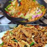 Schüssel mit chinesischen Nudeln und Hähnchen in einer würzigen Sauce.