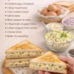 Leckeres Eiersalat-Sandwich auf einem Teller serviert