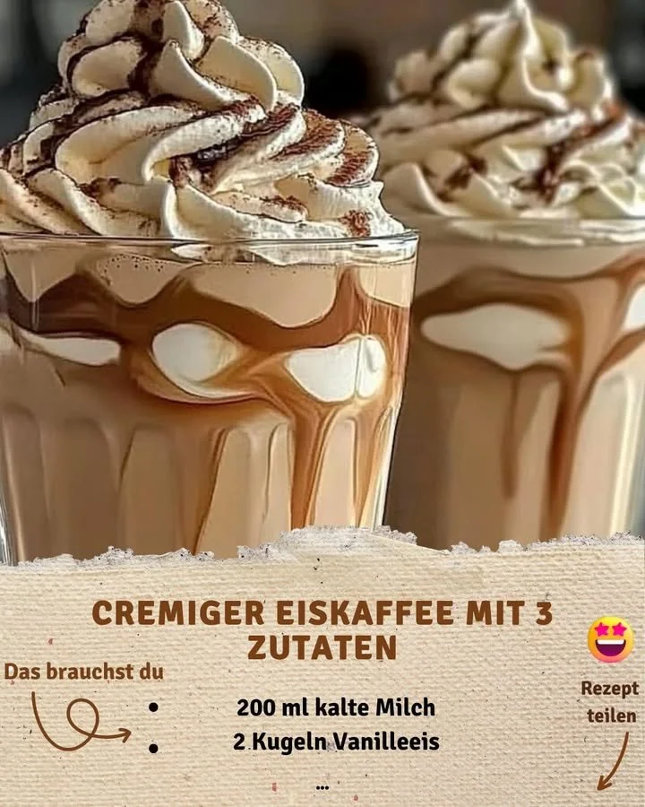 Cremiger Eiskaffee im Glas mit Sahne und Eiswürfeln