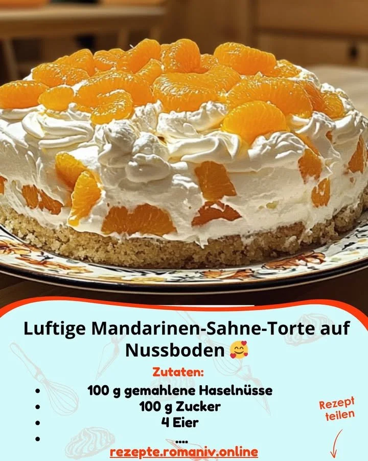 Luftige Mandarinen-Sahne-Torte auf Nussboden, perfekt für besondere Anlässe.